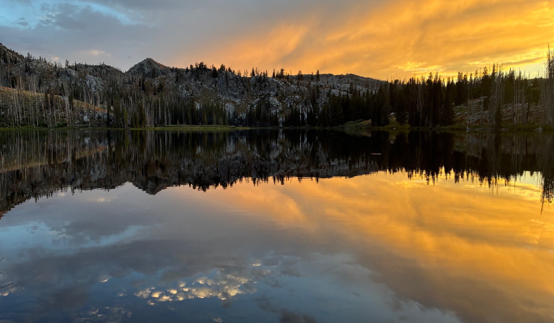 Moonlit Idaho lake beneath the mountains