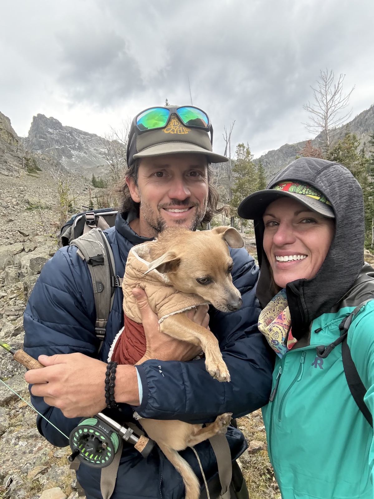 Jason and Chasta with their dog beneath the cliffs of Hells Canyon and the Seven Devils
